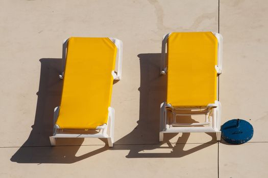 yellow longers, chairs for top lounger
