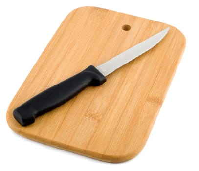 Knife on the chopping board close-up isolated on white background