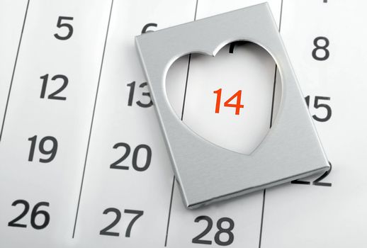 heart marker on calendar page showing February Valentine's Day