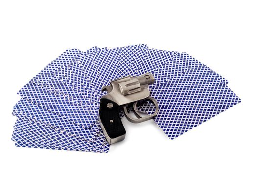 gun in playing cards , close-up isolated on white background