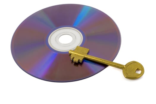 golden key on compact disk isolated on white background