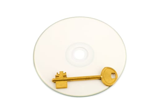 golden key on compact disk isolated on white background