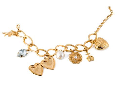 gold heart in necklace isolated on white background