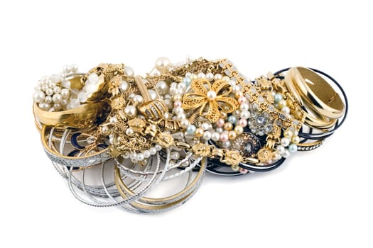 bracelets ,diamonds,ring,ring set with a stone,chain golden isolated on white background