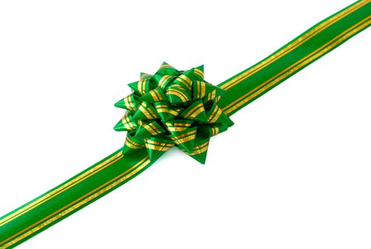 Gift ribbon and green bow on a white background