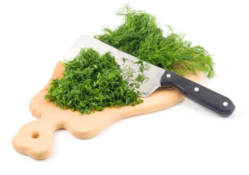 Chopping dill herb on a wooden chopping board, isolated on white background.vegetarian food.