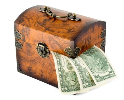 Wooden treasure chest locked and dollars