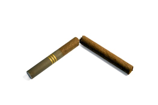 Broken cigarette, isolated in white background