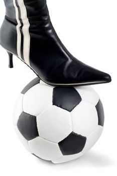 Boots on ball soccer close-up , isolated on white background