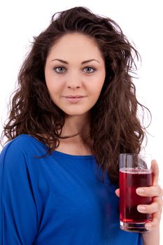 beautiful smiling brunette woman is drinking red juice isolated on white