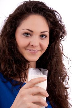 beautiful smiling woman is drinking milk isolated on white background