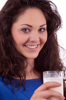 beautiful smiling woman is drinking milk isolated on white background