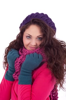 beautiful young smiling girl with hat and scarf in winter isolated on white background