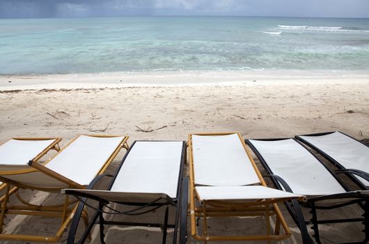 Ocean landscape from the deck chairs on the beach 