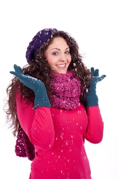 beautiful smiling brunette woman in snow in winter  isolated on white background