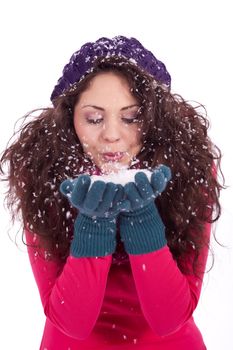 beautiful smiling brunette woman in snow in winter  isolated on white background