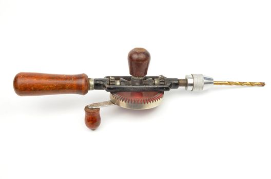vintage hand drill isolated on white background
