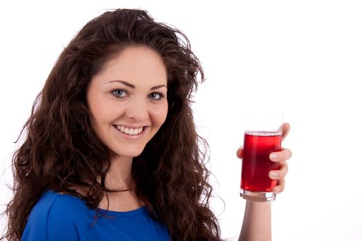 beautiful smiling brunette woman is drinking red juice isolated on white