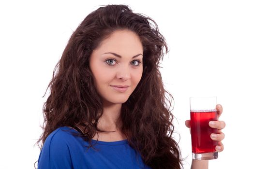 beautiful smiling brunette woman is drinking red juice isolated on white