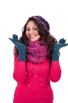 beautiful smiling brunette woman in snow in winter  isolated on white background