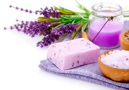 lavender soap, bath salt and candle isolated on white background