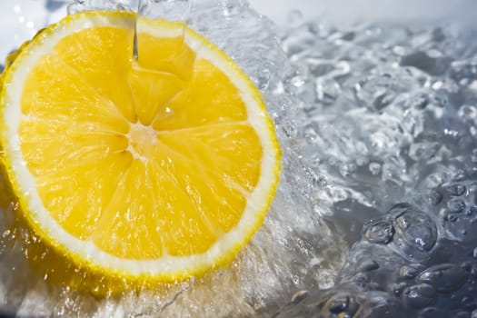 Fresh water drops on a lemon 