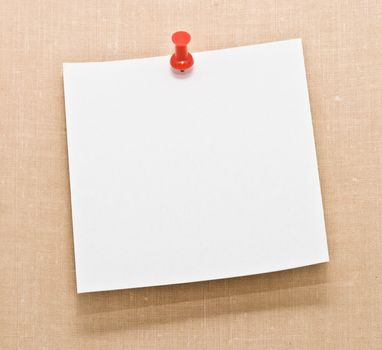 Note white paper tacked on a wall