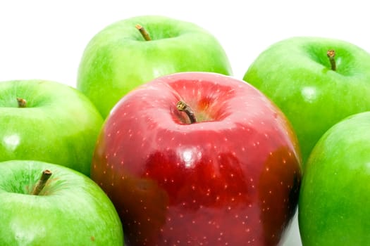 Red and green apples on white