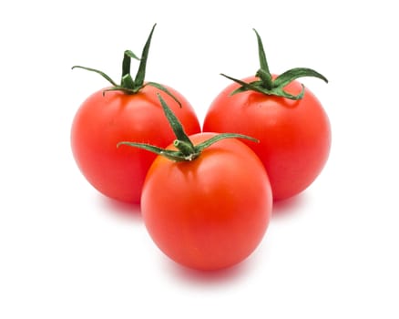 Fresh tomatoes isolated on white background