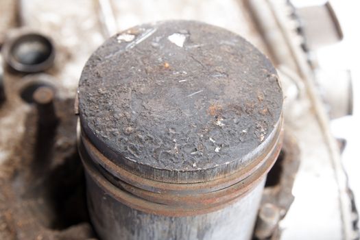 close up of old dirty engine piston