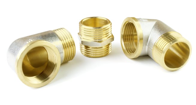 Three brass threaded details on a white background