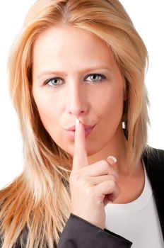 Business woman with her finger over her mouth, isolated in a white background