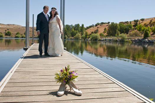 Beautiful bride and loving groom on their wedding day