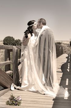 Beautiful bride and loving groom on their wedding day