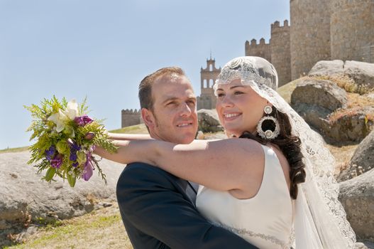 Beautiful bride and loving groom on their wedding day