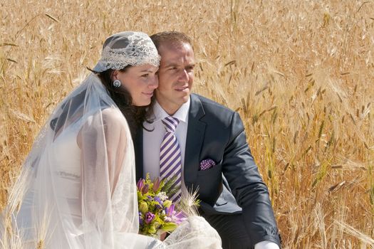 Beautiful bride and loving groom on their wedding day