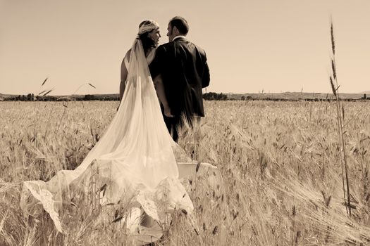 Beautiful bride and loving groom on their wedding day