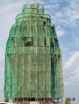 Independence monument in Phnom Penh covered with scaffolding under repair