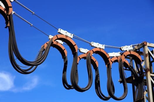 Mobile power lines on the blue sky