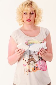 Young woman reads a leaflet for drugs