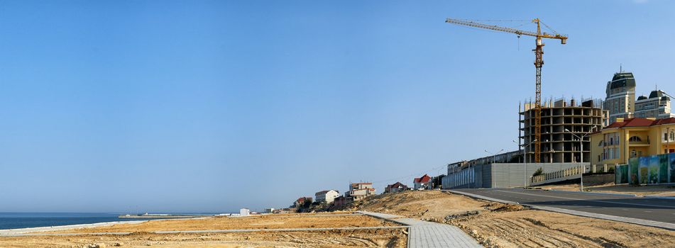 New building construction in Aktau of a multistorey apartment block on a coastal beach overlooking the Caspian sea