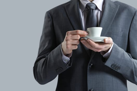 close up business man with coffee cup