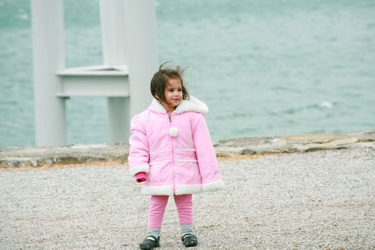 Little girl wearing winter outwear