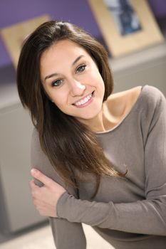 portrait of young attractive woman at home