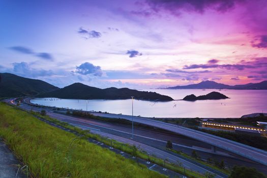 Traffic highway in Hong Kong at sunset