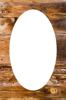 Isolated white oval place for text photograph image in center of old building wall made of wooden planks.