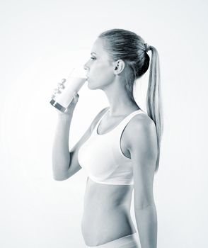 young woman drinking milk