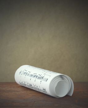 Close up of rolls of sheet music, copy space