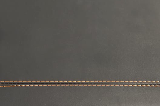 horizontal stitched leather background or texture