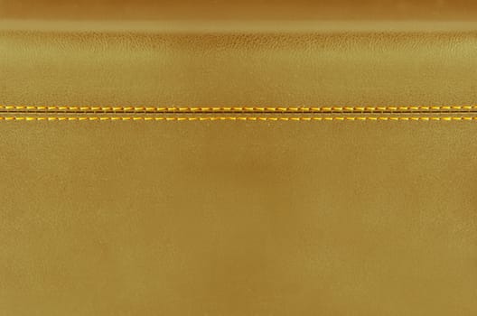 golden  horizontal stitched leather background  